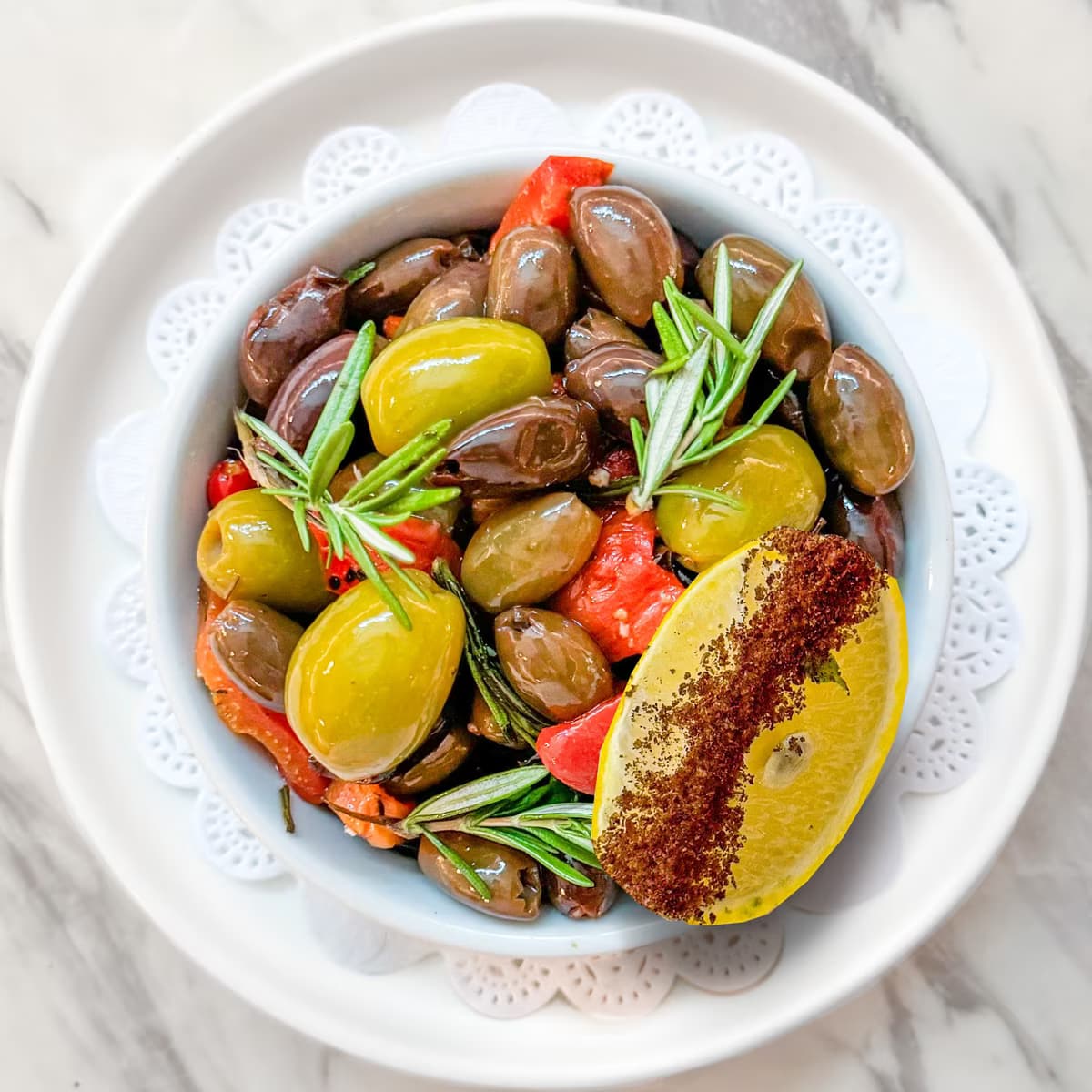 Side Fried Olives with rosemary, roasted capsicum