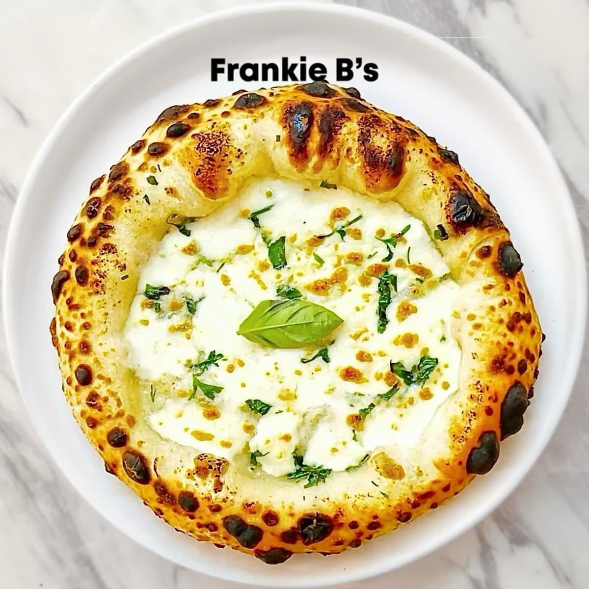 Garlic Cheese Crust at Frankie B's – Wood-fired pizza crust with garlic sauce and mozzarella