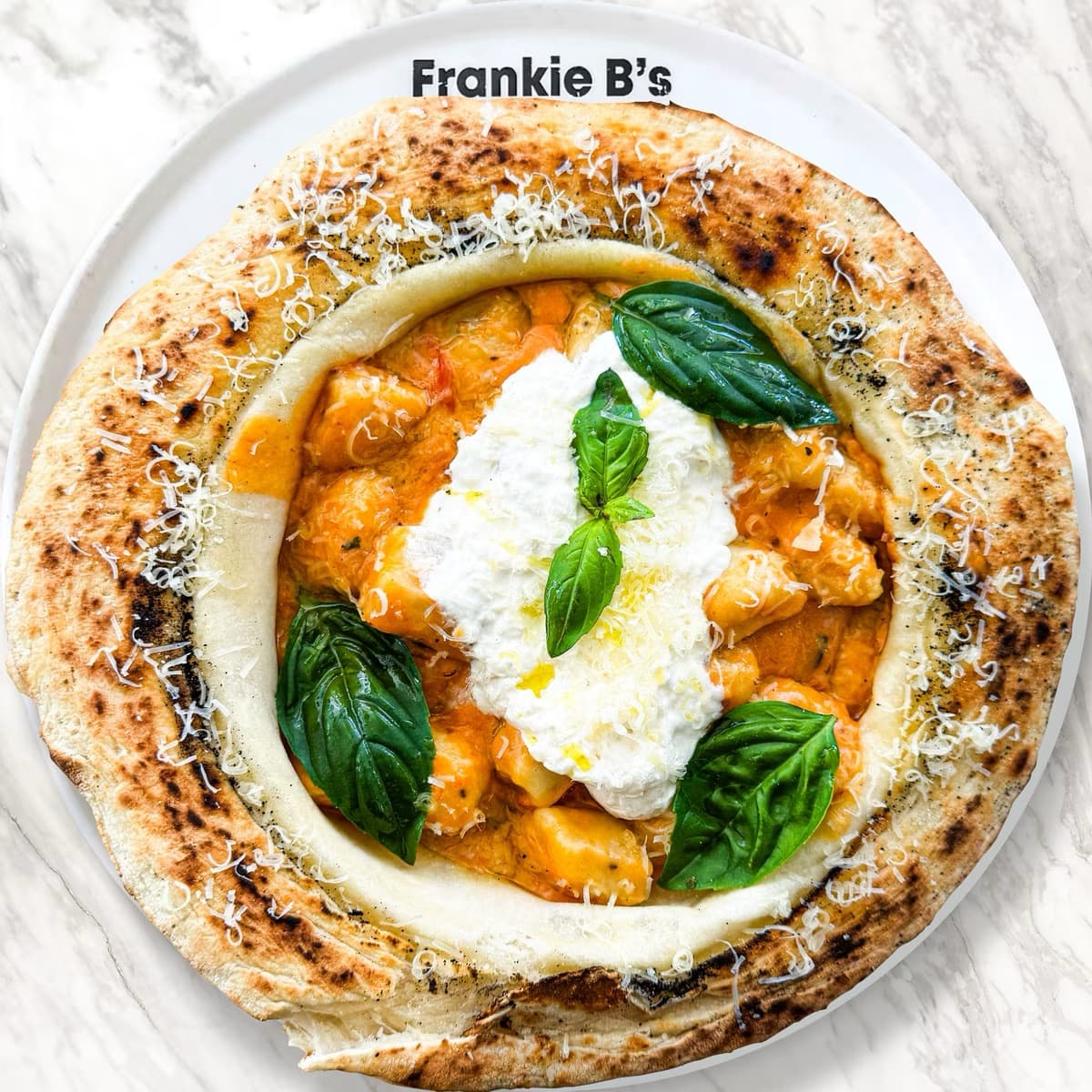 Delicious wood-fired bread bowl filled with creamy gnocchi options.